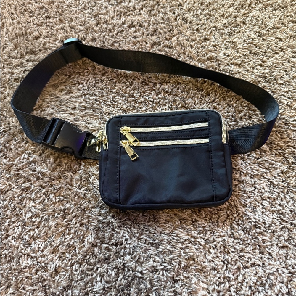 Elegant Black Belt Bag with Gold Accents